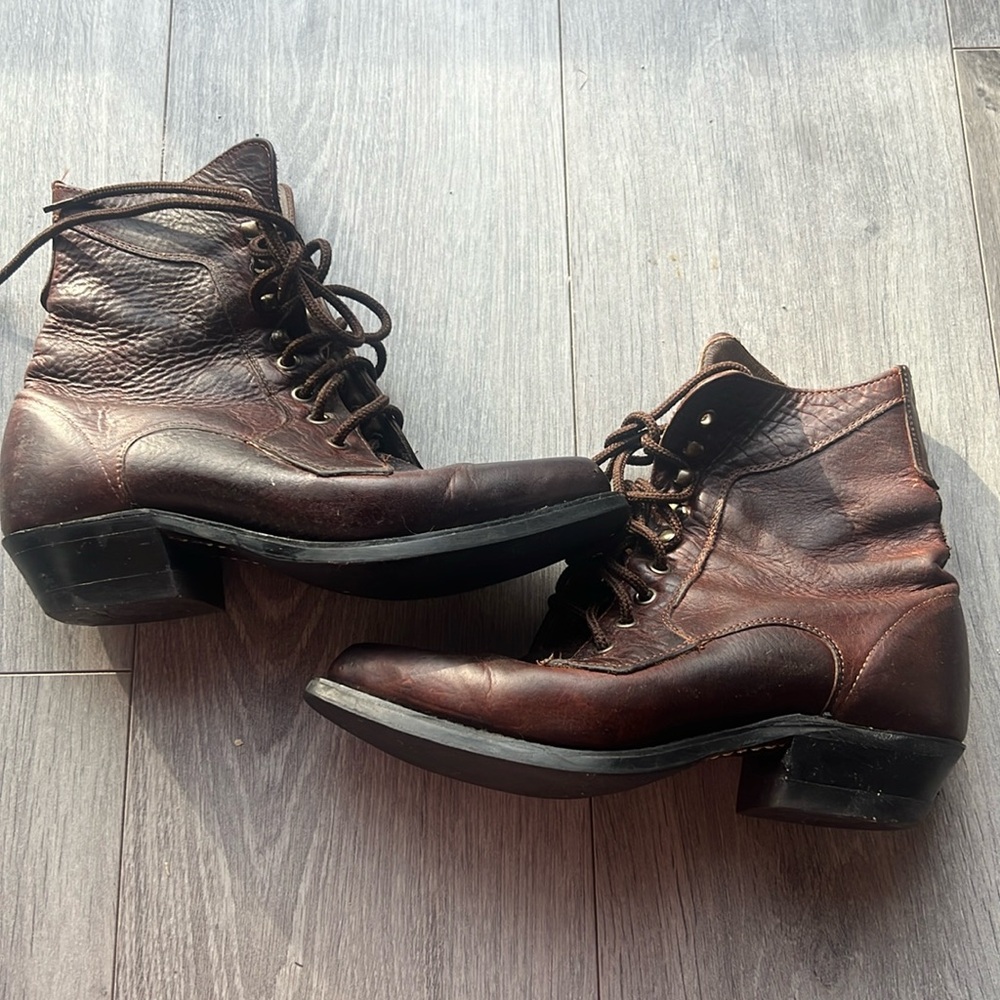 Silver Rebel cowgirl lace up booties. Size 7. Vibram soles, leather.